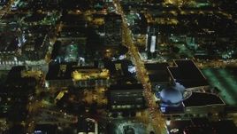 4K aerial stock footage of following Sunset Blvd past Cinerama Dome, to North Gower Street; Hollywood, California, night Aerial Stock Footage | DCA07_084