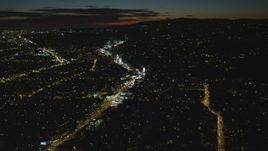 4K aerial stock footage of approaching Sunset Blvd and Sunset Strip, West Hollywood, California, night Aerial Stock Footage | DCA07_091