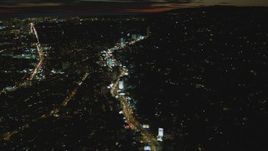 4K aerial stock footage of following Sunset Blvd, approaching Sunset Strip, West Hollywood, California, night Aerial Stock Footage | DCA07_093