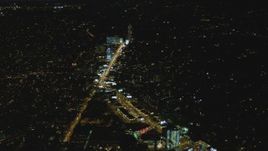4K aerial stock footage of approaching the Sunset Strip, West Hollywood, California, night Aerial Stock Footage | DCA07_094