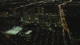 4K aerial stock footage of approaching skyscrapers, Century City, California, night Aerial Stock Footage | DCA07_097