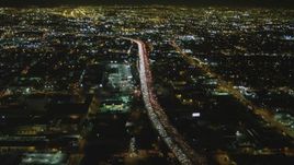 4K aerial stock footage of approaching Interstate 10, Downtown, Los Angeles, California, night Aerial Stock Footage | DCA07_113