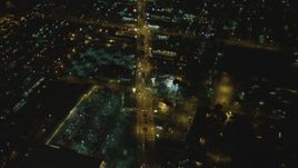 4K aerial stock footage of flying over Atlantic Avenue, Bell, California, night Aerial Stock Footage | DCA07_116