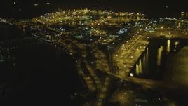 4K aerial stock footage of panning across the Port of Long Beach, Long Beach, California, night Aerial Stock Footage | DCA07_123