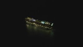 4K aerial stock footage of orbiting a cruise ship sailing near Port of Los Angeles, San Pedro, California, night Aerial Stock Footage | DCA07_153