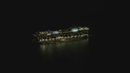 4K aerial stock footage of orbiting a cruise ship sailing near the Port of Los Angeles, San Pedro, California, night Aerial Stock Footage | DCA07_154