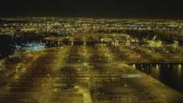 4K aerial stock footage of panning across the Port of Los Angeles, San Pedro, California, night Aerial Stock Footage | DCA07_158