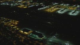 4K aerial stock footage of a passenger jet taxiing, LAX (Los Angeles International Airport), Los Angeles, California, night Aerial Stock Footage | DCA07_166