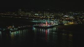 4K aerial stock footage of flying by the Santa Monica Pier, Santa Monica, California, night Aerial Stock Footage | DCA07_172