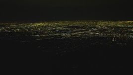 4K aerial stock footage pan across San Fernando Valley from off the coast, San Fernando Valley, California, night Aerial Stock Footage | DCA07_177