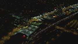 4K aerial stock footage pan across Highway 101, tilting up, Woodland Hills, California, night Aerial Stock Footage | DCA07_179