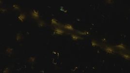 4K aerial stock footage of a bird's eye view of a residential neighborhood, Woodland Hills, California, night Aerial Stock Footage | DCA07_185