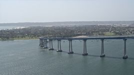 4K aerial stock footage of a reverse view of the Coronado Bridge in San Diego, California Aerial Stock Footage | DCA08_023