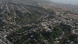 4K aerial stock footage flyby urban residential neighborhoods in Tijuana, Mexico Aerial Stock Footage | DCA08_044