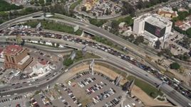 4K aerial stock footage tilt to a bird's eye view of heavy traffic on the US/Mexico Border, Tijuana Aerial Stock Footage | DCA08_051
