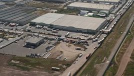 4K aerial stock footage of warehouse buildings and big rigs, Tijuana, Mexico Aerial Stock Footage | DCA08_079