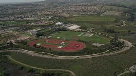 4K aerial stock footage approach Olympic training fields, tilt to bird's eye view, Chula Vista, California Aerial Stock Footage | DCA08_112E