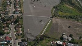 4K aerial stock footage orbit parking lot suburban homes, Spring Valley, California Aerial Stock Footage | DCA08_124