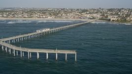 4K aerial stock footage flyby pier and oceanfront neighborhoods, Ocean Beach, California Aerial Stock Footage | DCA08_158