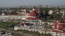 4K aerial stock footage orbit and fly away from oceanfront Hotel del Coronado, California Aerial Stock Footage | DCA08_212E