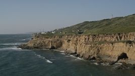 4K aerial stock footage of passing coastal cliffs in Point Loma, California Aerial Stock Footage | DCA08_222