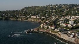 4K aerial stock footage pan across upscale, oceanfront homes and cliffs, La Jolla, California Aerial Stock Footage | DCA08_240