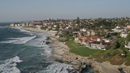 4K aerial stock footage of flying by upscale homes in an oceanfront neighborhood, La Jolla, California Aerial Stock Footage | DCA08_243