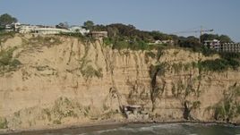 4K aerial stock footage tilt to reveal clifftop homes with ocean views, La Jolla, California Aerial Stock Footage | DCA08_250