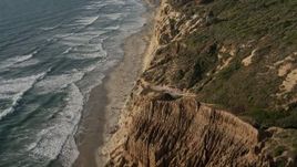 4K aerial stock footage of panning across coastal cliffs and beach, La Jolla, California Aerial Stock Footage | DCA08_257E