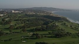 4K aerial stock footage fly over coastal cliffs to reveal a golf course, La Jolla, California Aerial Stock Footage | DCA08_259E