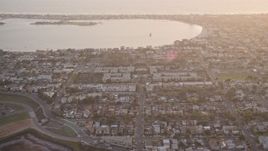 4K aerial stock footage of bayside suburban houses and park, Pacific Beach, California, Sunset Aerial Stock Footage | DCA08_286