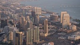 4K aerial stock footage approach and zoom out on skyscrapers, Downtown San Diego, California, Sunset Aerial Stock Footage | DCA08_292