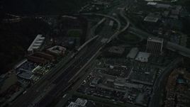 4K aerial stock footage fly away from freeway interchange, reveal a strip mall, Mission Valley, California, twilight Aerial Stock Footage | DCA08_333