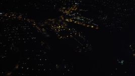 4K aerial stock footage of a reverse view of suburban neighborhoods, San Diego, California, Night Aerial Stock Footage | DCA08_341