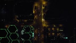 4K aerial stock footage of a bird's eye view of city streets and skyscrapers in Downtown San Diego, California, Night Aerial Stock Footage | DCA08_356