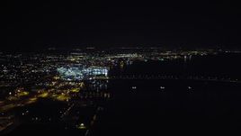 4K aerial stock footage of panning across downtown to reveal the Coronado Bridge and San Diego Bay, California, Night Aerial Stock Footage | DCA08_364