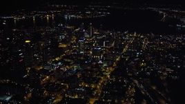 4K aerial stock footage of flying by city skyscrapers in Downtown San Diego, California, Night Aerial Stock Footage | DCA08_369