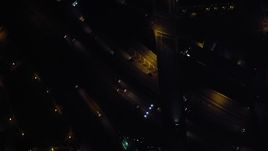 4K aerial stock footage of a bird's eye of city streets and skyscrapers, reveal the freeway, Downtown San Diego, California, Night Aerial Stock Footage | DCA08_377