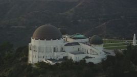 5K aerial stock footage orbit east side of the Griffith Observatory at sunset, California Aerial Stock Footage | DCLA_009