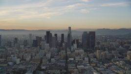 5K aerial stock footage of Downtown Los Angeles seen from south of the city at sunset, California Aerial Stock Footage | DCLA_018