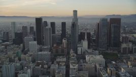 5K aerial stock footage tilt from 5th Street to reveal and approach Downtown Los Angeles skyscrapers at sunset, California Aerial Stock Footage | DCLA_019