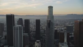 5K aerial stock footage tilt from 5th Street to reveal skyscrapers in Downtown Los Angeles at sunset, California Aerial Stock Footage | DCLA_020