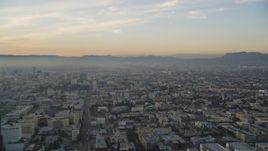 5K aerial stock footage approach Hollywood from Downtown Los Angeles, California at sunset Aerial Stock Footage | DCLA_022
