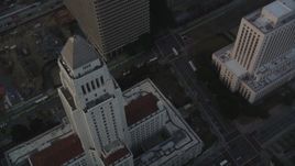 5K aerial stock footage approach Los Angeles City Hall at sunset in Downtown Los Angeles, California Aerial Stock Footage | DCLA_029