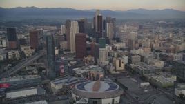 5K aerial stock footage of Staples Center, The Ritz-Carlton and skyscrapers in Downtown Los Angeles at sunset, California Aerial Stock Footage | DCLA_040