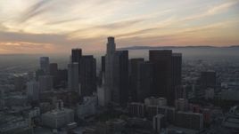 5K aerial stock footage approach Downtown Los Angeles with sunset-lit clouds overhead, California Aerial Stock Footage | DCLA_047