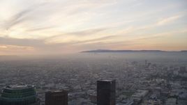 5K aerial stock footage of Century City seen from Downtown Los Angeles at sunset, California Aerial Stock Footage | DCLA_050