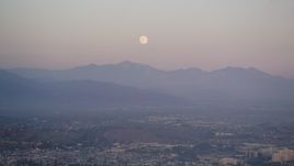 5K aerial stock footage tilt from full moon to reveal Downtown Los Angeles skyscrapers at twilight, California Aerial Stock Footage | DCLA_061