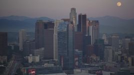 5K aerial stock footage flyby Downtown Los Angeles skyscrapers revealing full moon at twilight, California Aerial Stock Footage | DCLA_064