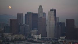 5K aerial stock footage of Downtown Los Angeles high-rises with the full moon overhead at twilight, California Aerial Stock Footage | DCLA_066